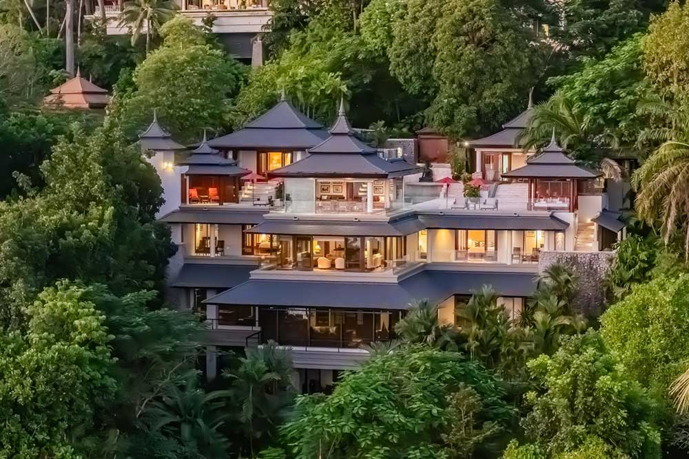 A six-bedroom ultra-luxury villa in Cherng Talay, Phuket, offering a private 21m pool, traditional Thai architecture, and stunning Andaman Sea views.